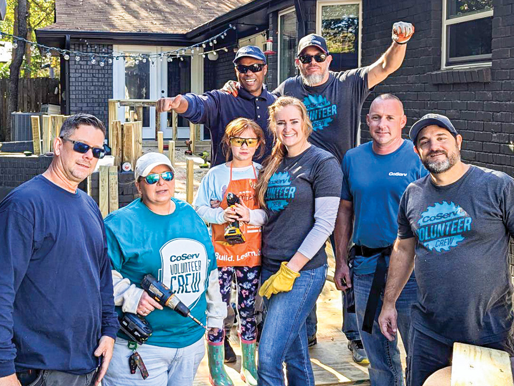 B: CoServ Employees volunteer on weekends to help build ramps for families in need.