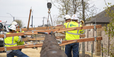 NOTE: THIS PROJECT WAS HALTED AND WILL BE REDESIGNED AS AN UNDERGROUND LINE. CAN USE THESE PHOTOS AS FILE ART BUT CAN'T MENTION THE SPECIFICS OF WHAT'S GOING ON IN THE PHOTOS, PER CODY COULTER. 
These photos are great representation of CoServ linemen erecting  new utility poles for a feeder line.