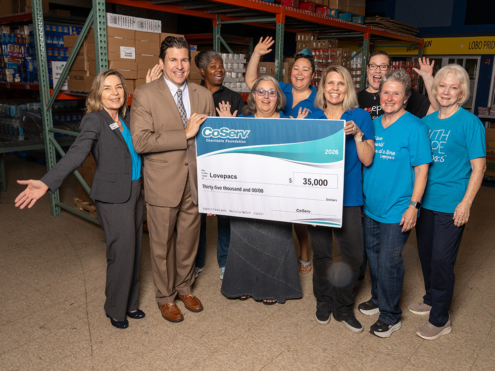 CoServ Charitable Foundation awarded a $35,000 grant to Love Pacs Little Elm to purchase food to feed children. Pictured (L to R) CCF Outreach Coordinator Jennifer Ebert , CoServ District 4 Director Will Kollar, Love Pacs Marthena Beckwith, Malinda Wheeler,  Leah Thrapp, Love Pacs Executive Director Autumn Chavez, Lindsay Subedreth, Kim Groff, Linda Mikalik. Photo by BRIAN ELLEDGE