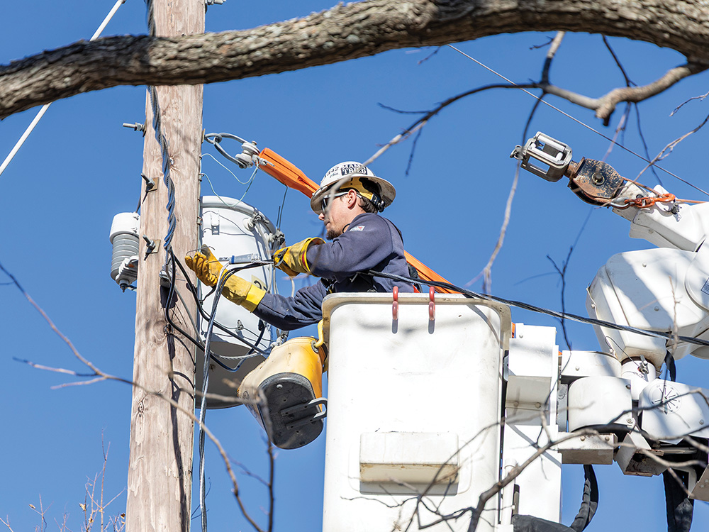 CoServ Lineman Kenny Beutter in the field.